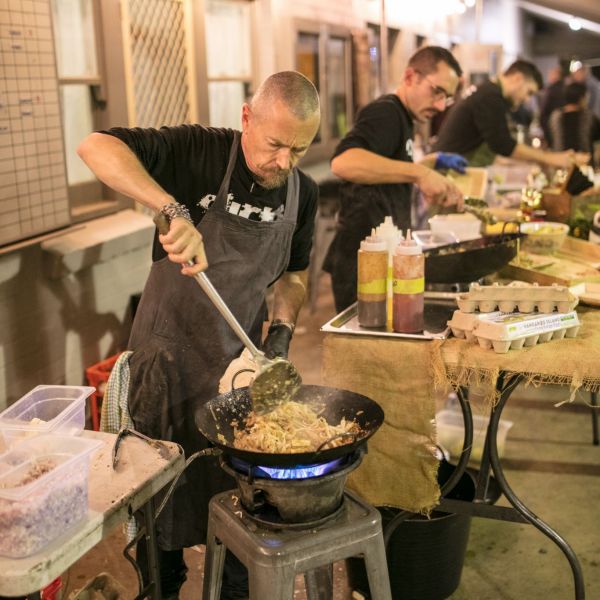 Simon stirring the wok