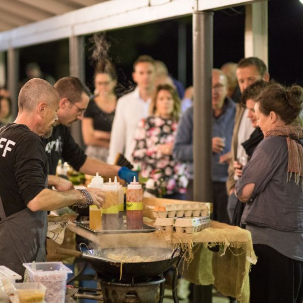 Crowds lining up to eat the fast and fresh cooking